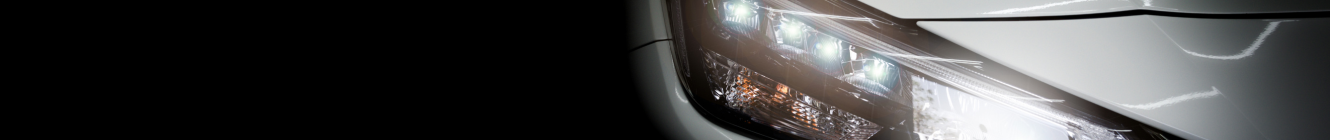 Detail eines Autos: Frontlicht